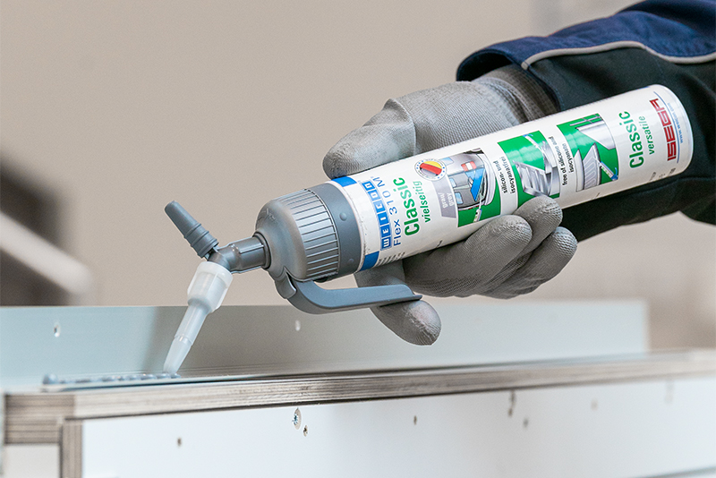 caulk, sealant, glue, syringe, hand